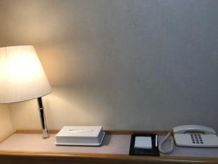 Sunny Stone Hotel Suita Quarto foto