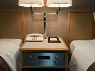 Sunny Stone Hotel Suita Quarto foto